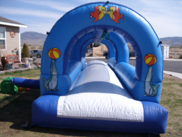 Rocket ship bounce house rental Reno NV — themed inflatable for birthday parties